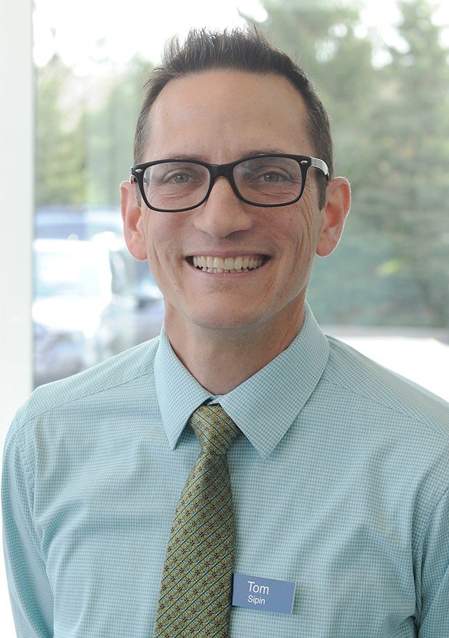 TOM SIPIN
